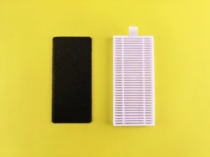 black and white foam air filter on yellow background